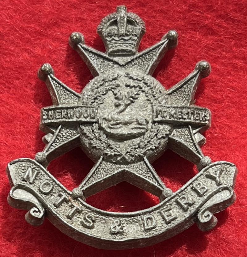 N&D Plastic Cap Badge