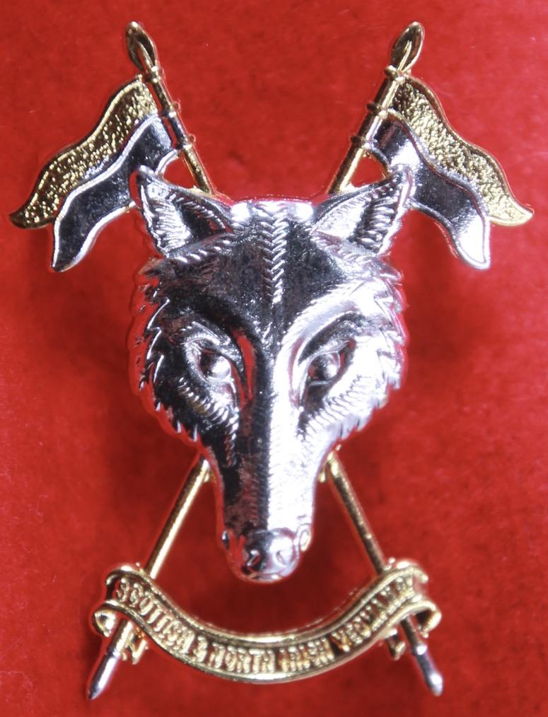 S&NIY Cap Badge